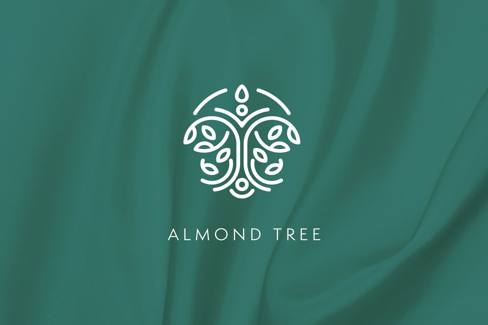 Almond Tree Therapies, identidade visual para terapeuta holístico nos Açores, logotipo branco sobre fundo verde-água